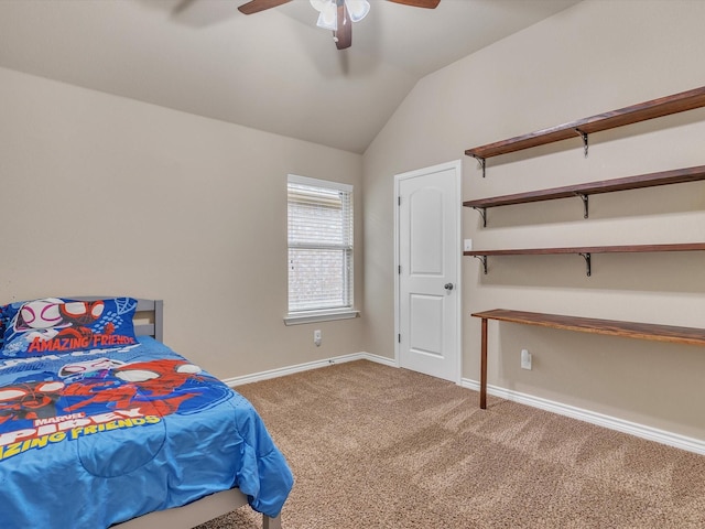 bedroom featuring vaulted ceiling, baseboards, ceiling fan, and carpet flooring
