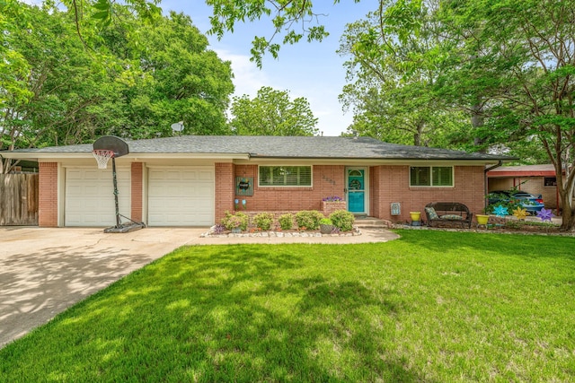 ranch-style home featuring brick siding, an attached garage, driveway, and a front yard