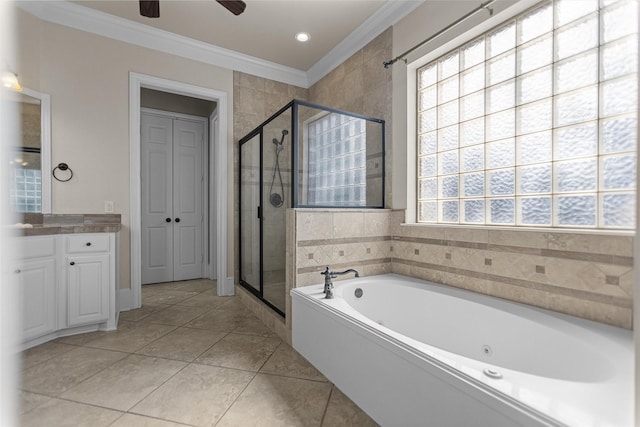 bathroom featuring tile patterned flooring, vanity, a whirlpool tub, ornamental molding, and a stall shower