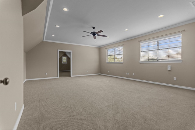 interior space with recessed lighting, carpet flooring, baseboards, and crown molding