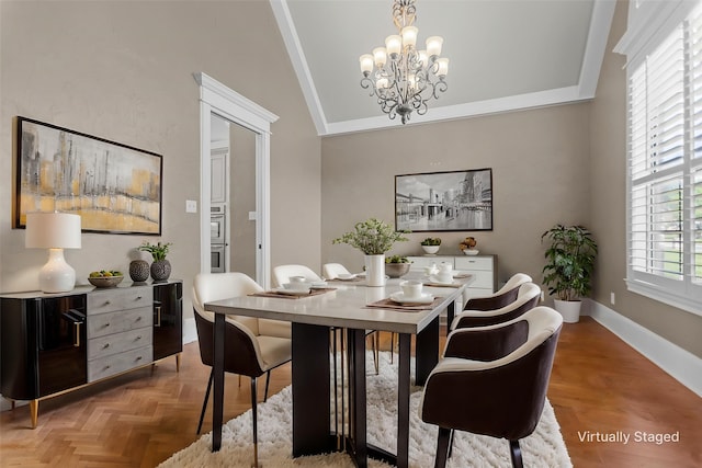 dining area featuring crown molding, baseboards, a notable chandelier, and vaulted ceiling
