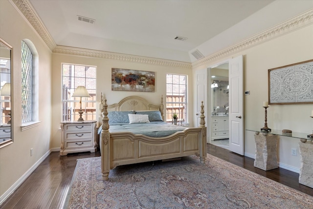 bedroom with dark wood-style floors, visible vents, multiple windows, and baseboards