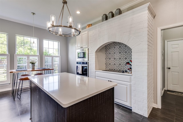 122 Forest Hills Cir, Gunter, TX 75058 - kitchen featuring baseboards, white cabinets, and appliances with stainless steel finishes