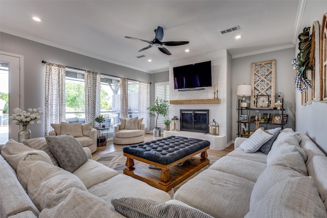 122 Forest Hills Cir, Gunter, TX 75058 - living room with visible vents, ceiling fan, recessed lighting, a brick fireplace, and wood finished floors