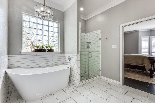122 Forest Hills Cir, Gunter, TX 75058 - ensuite bathroom with connected bathroom, a freestanding tub, crown molding, a stall shower, and marble finish floor