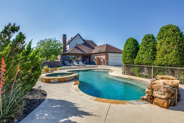 122 Forest Hills Cir, Gunter, TX 75058 - view of swimming pool with fence, a patio area, and a pool with connected hot tub