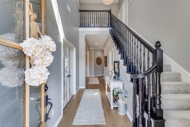 122 Forest Hills Cir, Gunter, TX 75058 - entryway with stairway, wood finished floors, a high ceiling, and baseboards