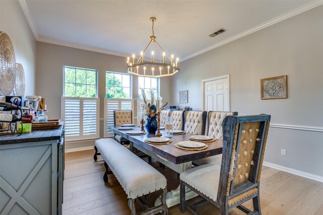122 Forest Hills Cir, Gunter, TX 75058 - dining area with baseboards, visible vents, a notable chandelier, and light wood-type flooring