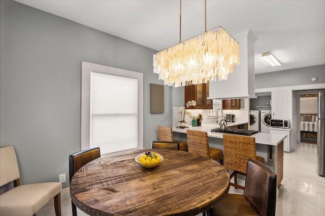 dining area featuring separate washer and dryer