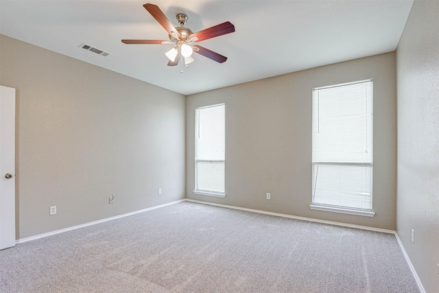 1108 Mourning Dove Dr, Burleson, TX 76028 - carpeted empty room featuring visible vents, a ceiling fan, and baseboards
