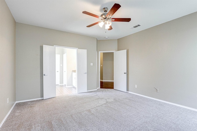 1108 Mourning Dove Dr, Burleson, TX 76028 - unfurnished bedroom with light colored carpet, baseboards, visible vents, and ceiling fan