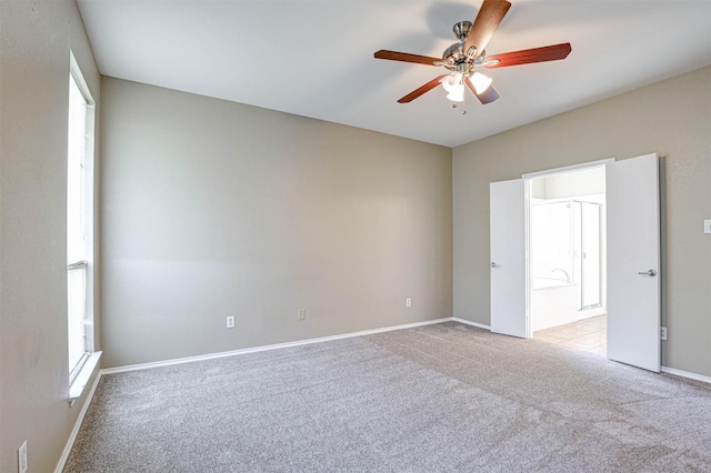1108 Mourning Dove Dr, Burleson, TX 76028 - spare room with ceiling fan, light carpet, baseboards, and plenty of natural light