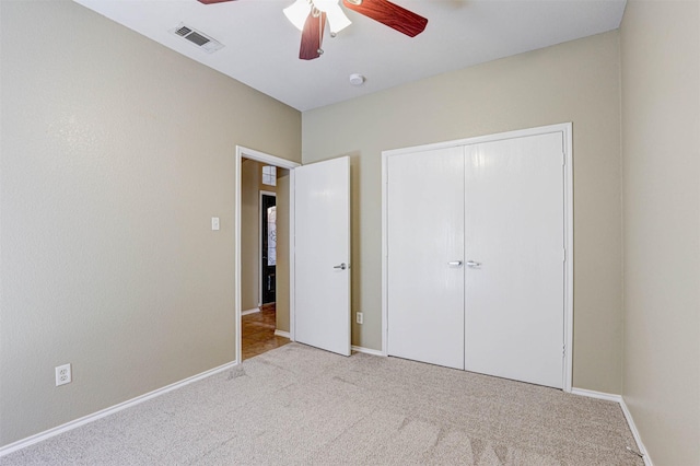1108 Mourning Dove Dr, Burleson, TX 76028 - unfurnished bedroom with visible vents, carpet floors, a closet, baseboards, and a ceiling fan