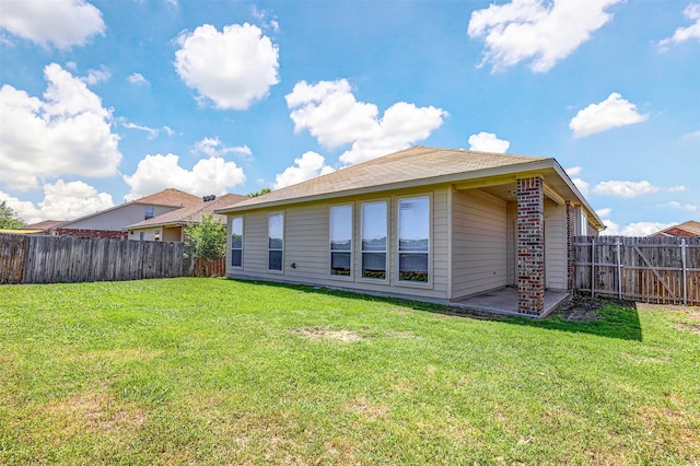 1108 Mourning Dove Dr, Burleson, TX 76028 - rear view of property featuring a yard, a fenced backyard, and a patio area