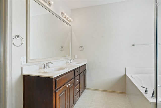 1441 Elkford Ln, Fort Worth, TX 76247 - full bath featuring baseboards, double vanity, and a garden tub
