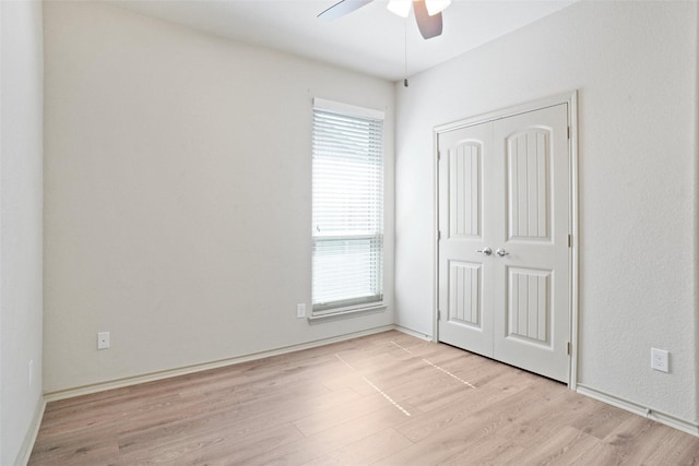 1441 Elkford Ln, Fort Worth, TX 76247 - unfurnished bedroom featuring light wood-style floors, a closet, and ceiling fan
