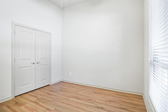 1441 Elkford Ln, Fort Worth, TX 76247 - unfurnished bedroom with light wood-style flooring and a closet