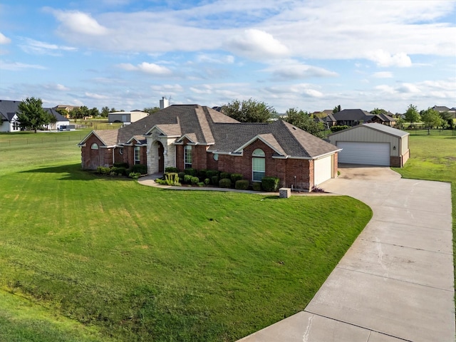 125 Deer Stream Ct, Azle, TX 76020 - ranch-style home featuring a detached garage, brick siding, a shingled roof, and a front lawn