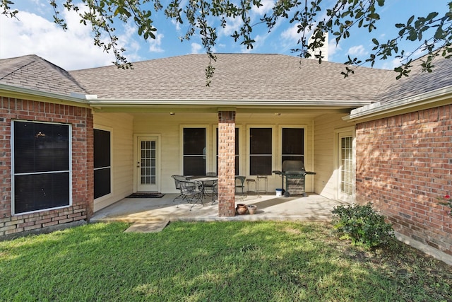 125 Deer Stream Ct, Azle, TX 76020 - back of property featuring brick siding, a yard, and roof with shingles
