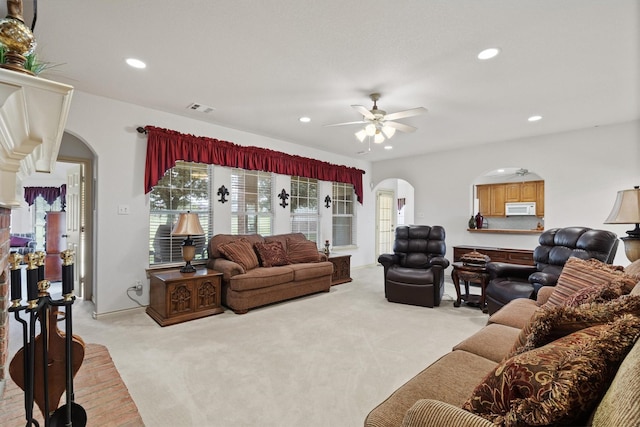 125 Deer Stream Ct, Azle, TX 76020 - living area with light colored carpet, arched walkways, recessed lighting, a wealth of natural light, and a ceiling fan