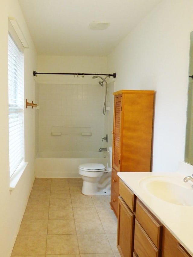 full bath featuring toilet, tub / shower combination, vanity, and tile patterned flooring