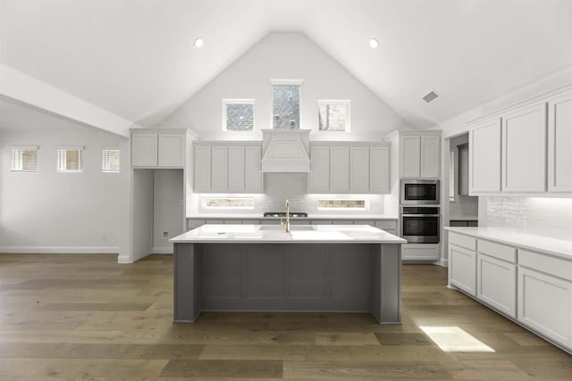 3505 Paintbrush Path, Melissa, TX 75454 - kitchen featuring stainless steel appliances, visible vents, white cabinetry, light countertops, and a kitchen island with sink