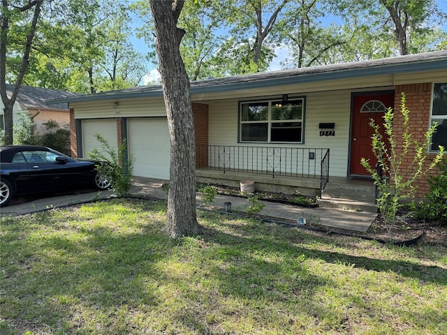 single story home featuring a garage, a porch, a front yard, and driveway