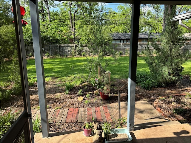 view of yard with a fenced backyard