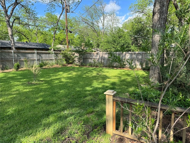 view of yard featuring a fenced backyard