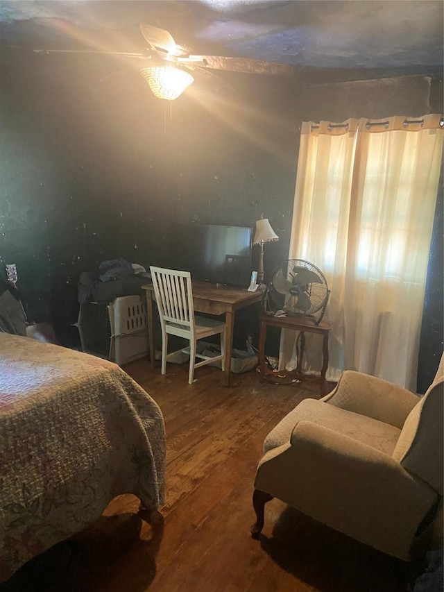 bedroom with wood finished floors