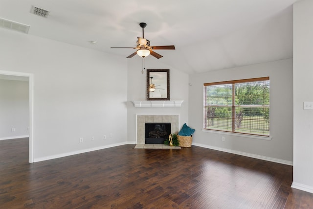 unfurnished living room with a tiled fireplace, baseboards, visible vents, a ceiling fan, and lofted ceiling