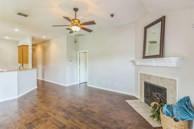 unfurnished living room with recessed lighting, wood finished floors, vaulted ceiling, ceiling fan, and visible vents