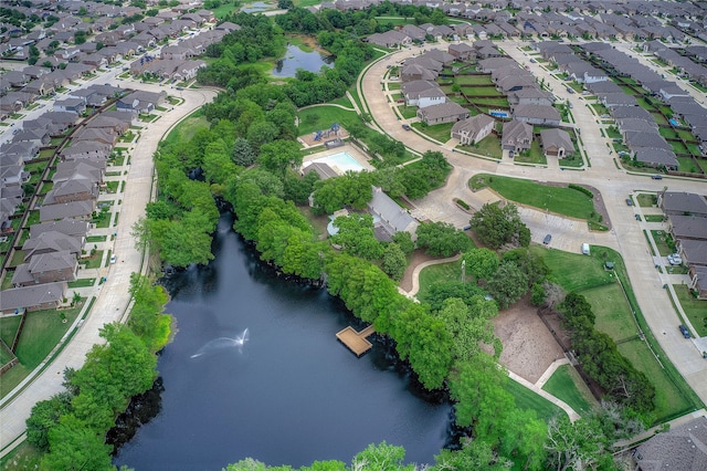 aerial view with a residential view and a water view