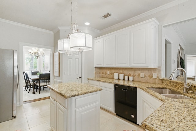kitchen with freestanding refrigerator, dishwasher, a sink, visible vents, and a notable chandelier