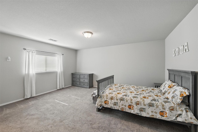 6309 Outrigger Rd, Fort Worth, TX 76179 - bedroom featuring carpet floors and a textured ceiling