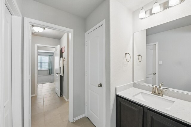 6309 Outrigger Rd, Fort Worth, TX 76179 - bathroom featuring tile patterned floors, vanity, and baseboards