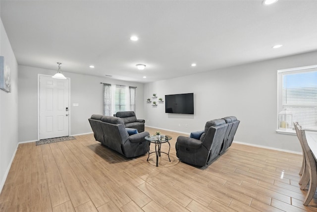 6309 Outrigger Rd, Fort Worth, TX 76179 - living area with light wood-type flooring, recessed lighting, and baseboards