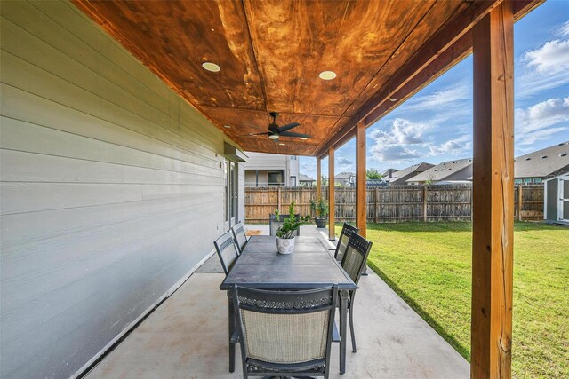 6309 Outrigger Rd, Fort Worth, TX 76179 - view of patio / terrace featuring a ceiling fan, a storage unit, and an outbuilding