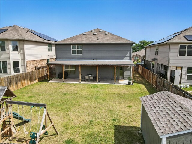 6309 Outrigger Rd, Fort Worth, TX 76179 - rear view of house with a patio area and a shingled roof