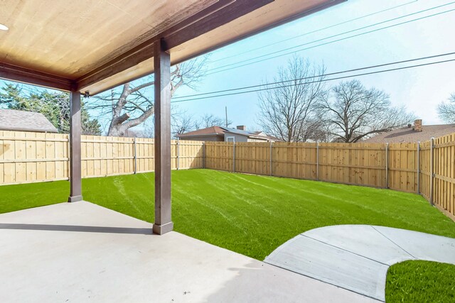 706 Poinsettia Dr, Lancaster, TX 75146 - fenced backyard with a patio