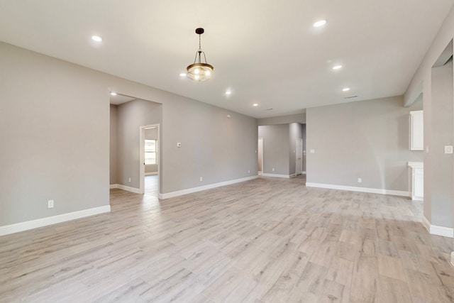 706 Poinsettia Dr, Lancaster, TX 75146 - unfurnished room with light wood finished floors and recessed lighting