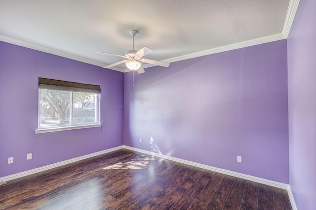 empty room featuring wood finished floors, ceiling fan, crown molding, and baseboards