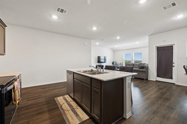 2802 Elk Rd, Crandall, TX 75114 - kitchen with a sink, range with electric cooktop, stainless steel dishwasher, dark wood-style flooring, and light countertops