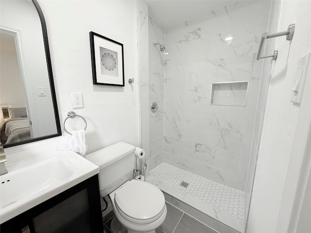 ensuite bathroom with toilet, vanity, a shower stall, and ensuite bath