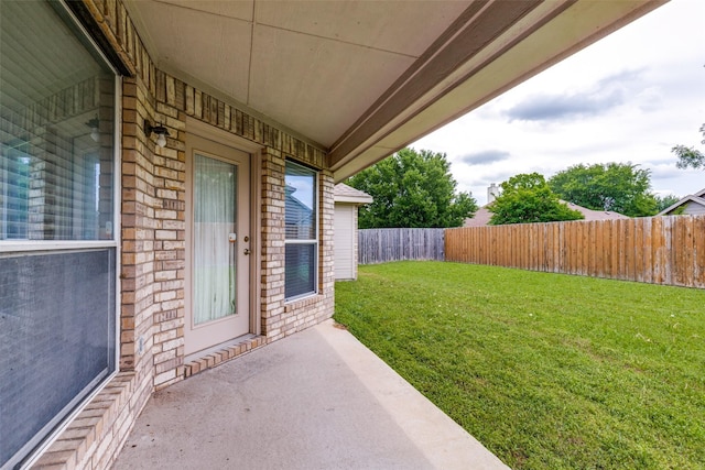 view of yard featuring a fenced backyard and a patio area