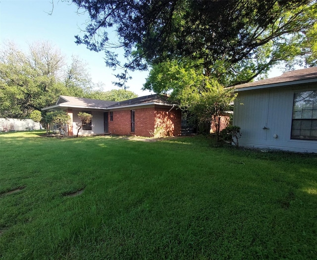 view of yard with fence