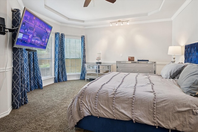 3001 Quail Holw, Mckinney, TX 75072 - carpeted bedroom with a tray ceiling, ornamental molding, a ceiling fan, and baseboards