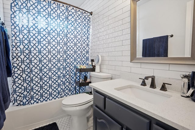 3001 Quail Holw, Mckinney, TX 75072 - full bathroom with tile walls, vanity, toilet, shower / bath combination with curtain, and decorative backsplash