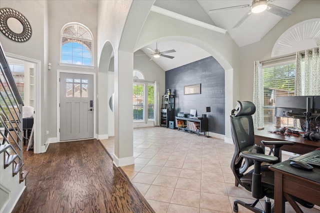 3001 Quail Holw, Mckinney, TX 75072 - foyer entrance with ceiling fan, baseboards, plenty of natural light, arched walkways, and high vaulted ceiling