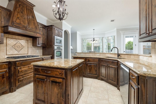 kitchen featuring custom range hood, appliances with stainless steel finishes, a sink, a notable chandelier, and light tile patterned flooring